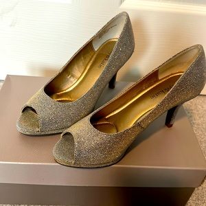 Shimmering gold heels with comfortable foot pad